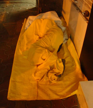 Another young employee, possibly the son of the shop trader, puts in an apprenticeship by sleeping outside the shop locked door. Quite literally, the ‘shop floor’ as an education